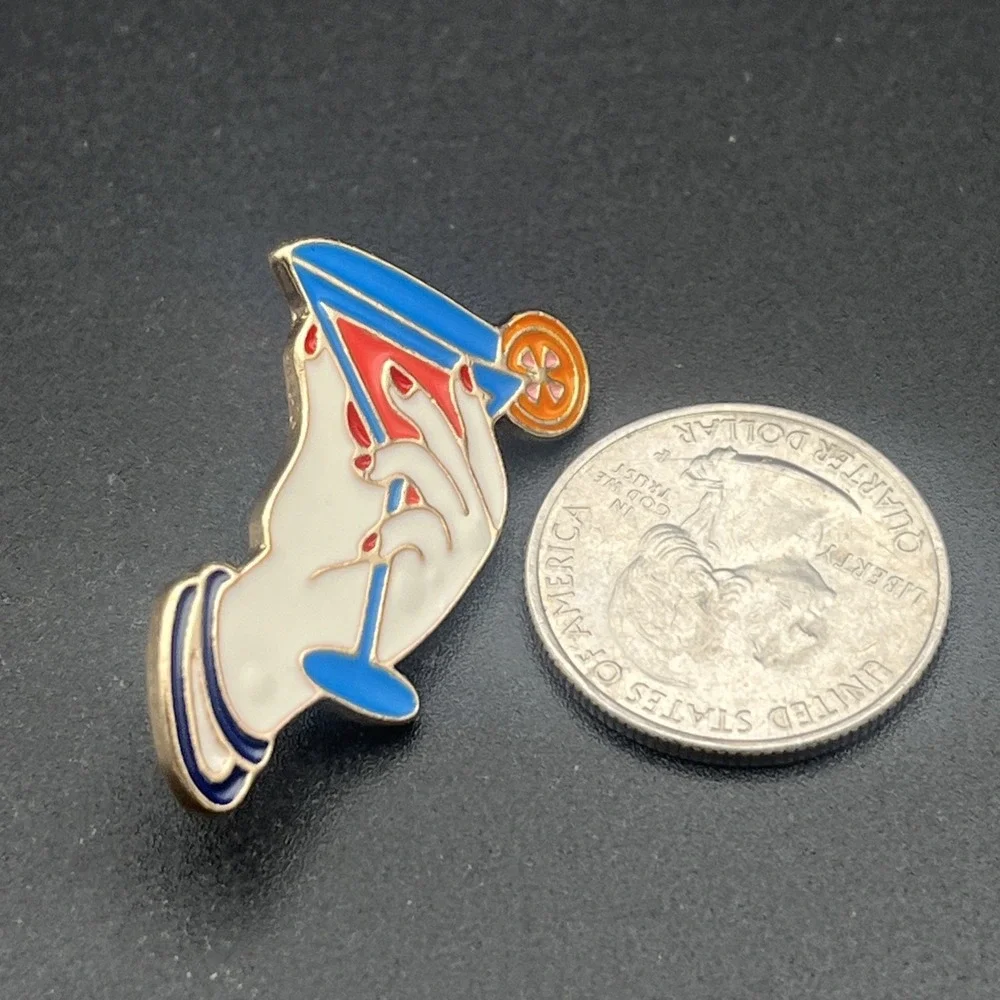 Hand Holding Martini Glass Orange‎ Slice Lapel Hat Pin